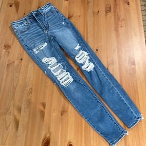 American Eagle Super Hi-Rise Jegging with ripped back hem